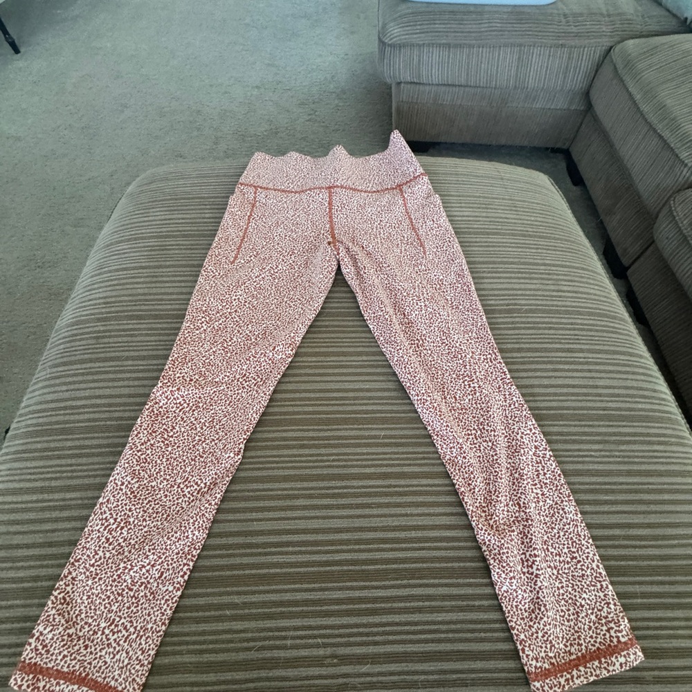Athleta rust and white Leopard Print Leggings size small